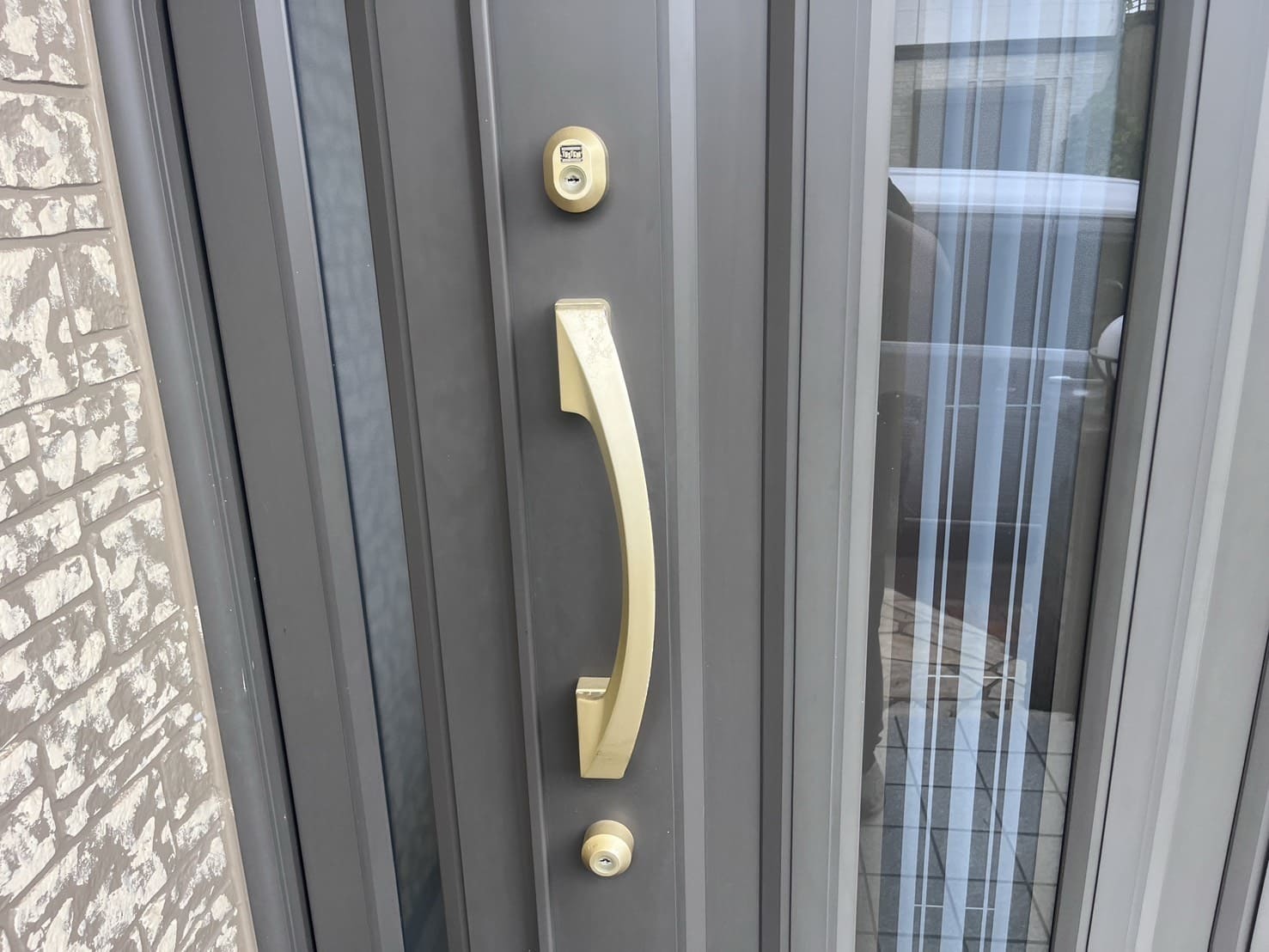 交換前の玄関の鍵【TOSTEM】（刻みキー）