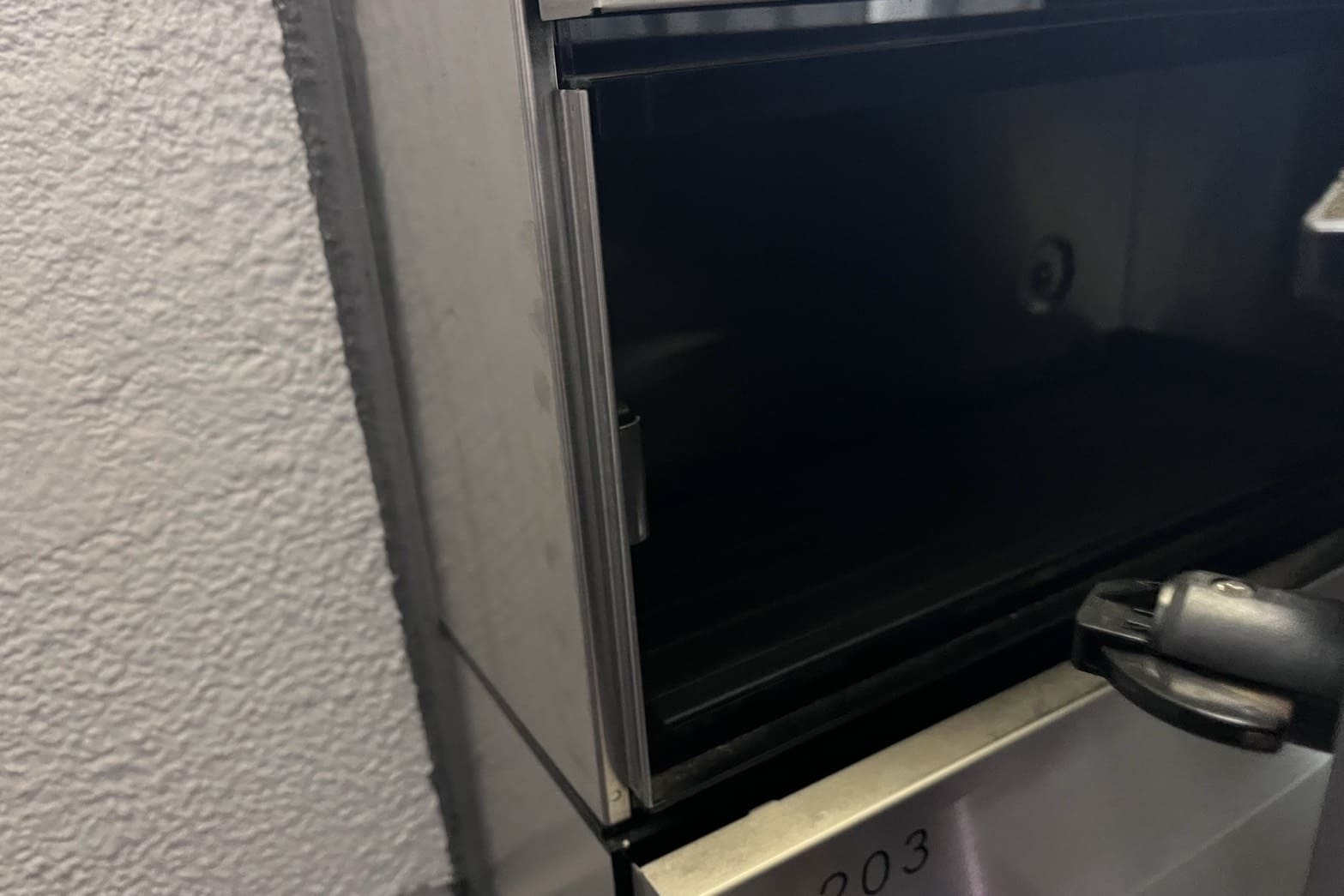 解錠後のポストの鍵（番号を探って解錠）